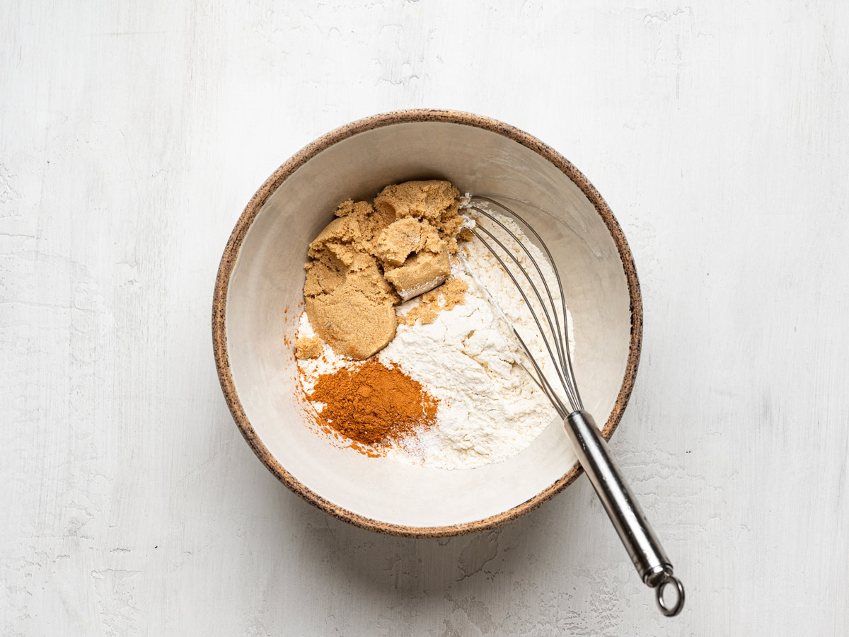 topping ingredients in a mixing bowl with whisk