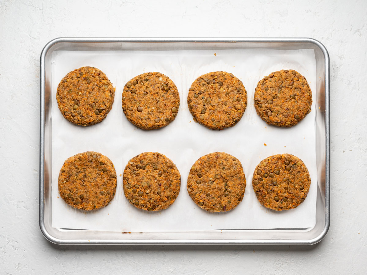 shaped lentil patties on sheet pan