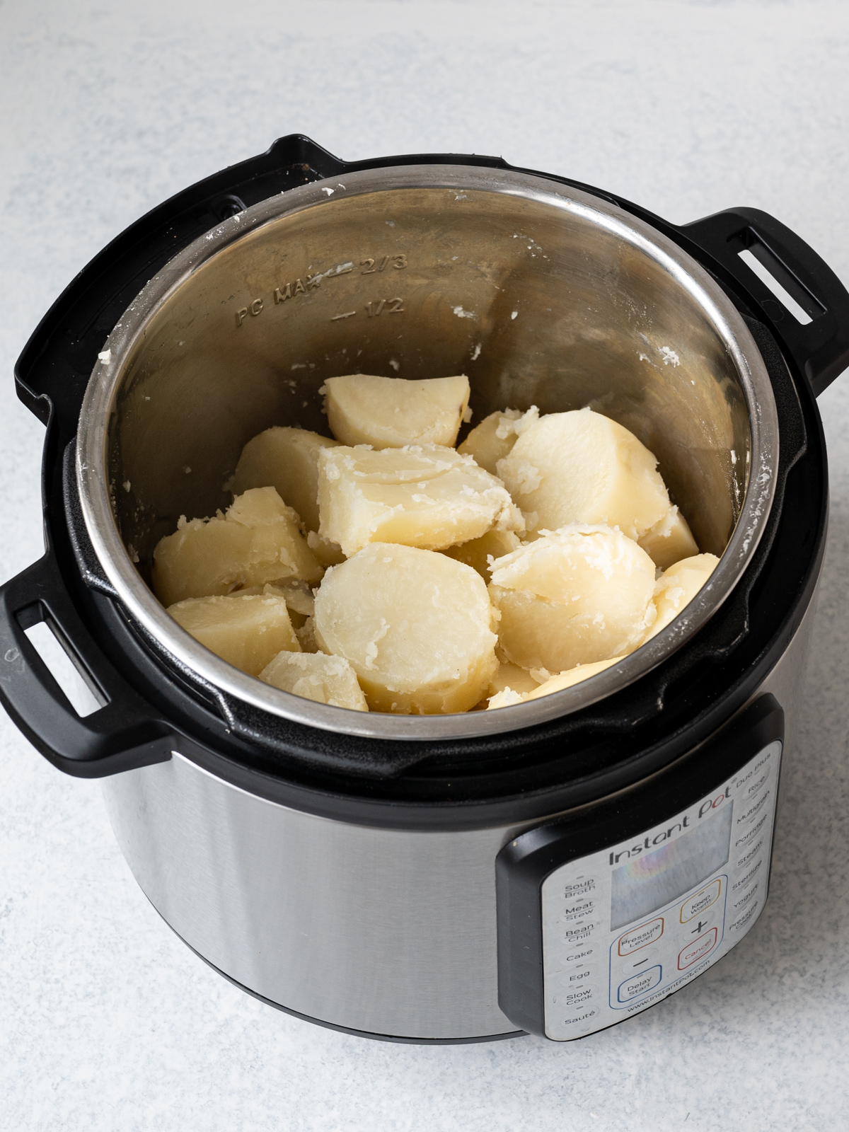 cooked and drained potato chunks in Instant pot liner
