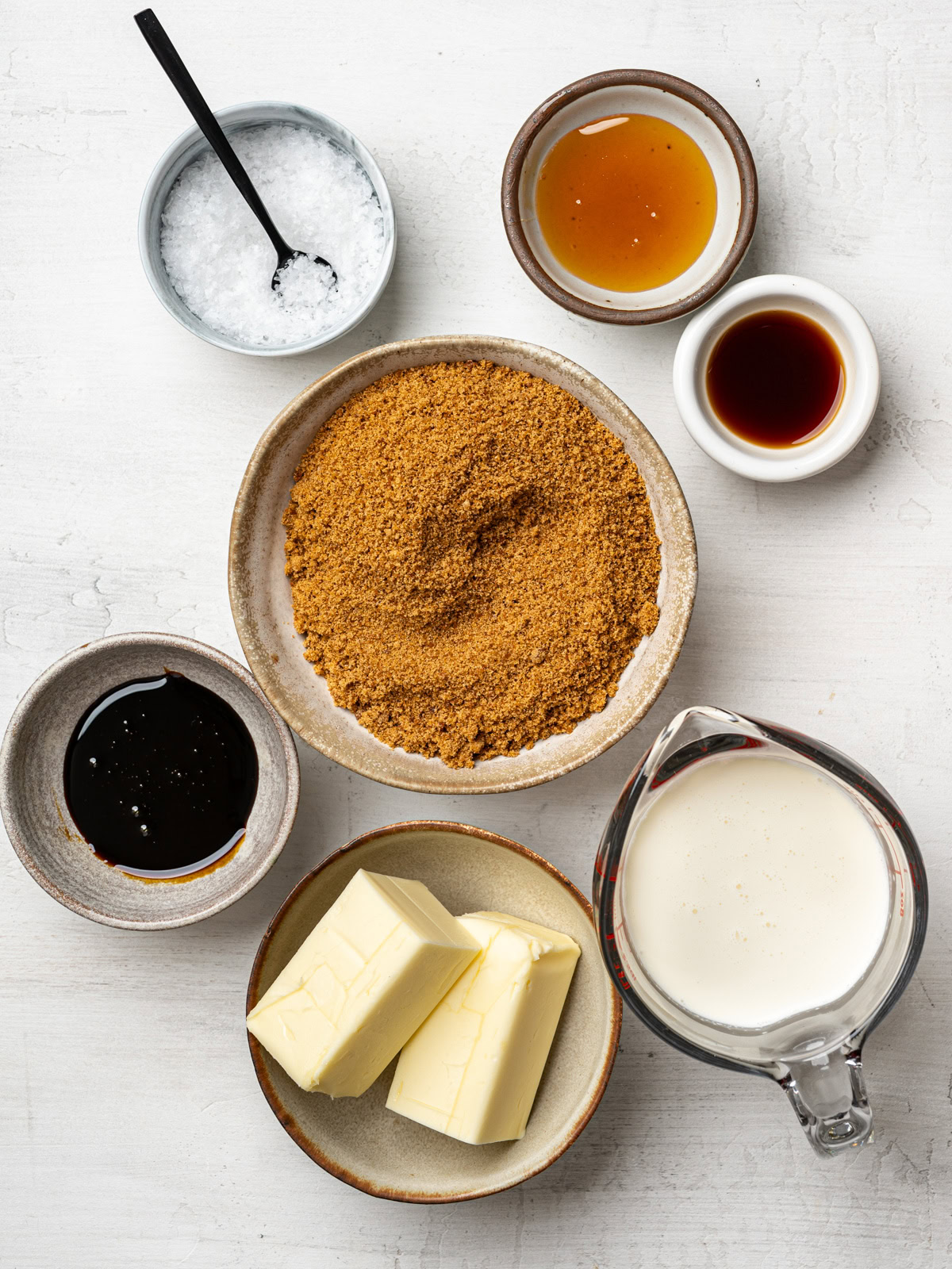 Ingredients to make the toffee sauce prepared in small bowls