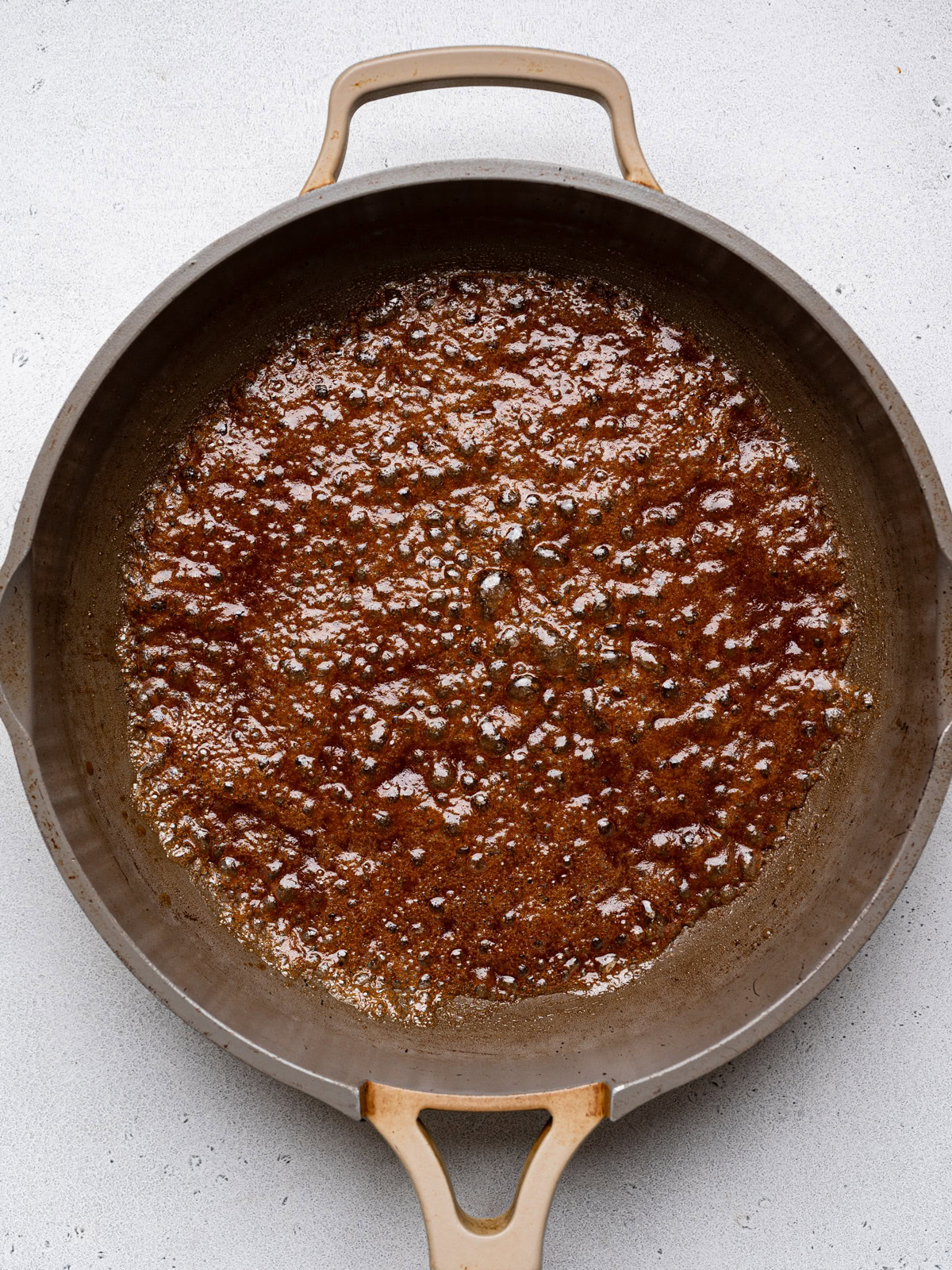 sugar mixture bubbling in hot skillet