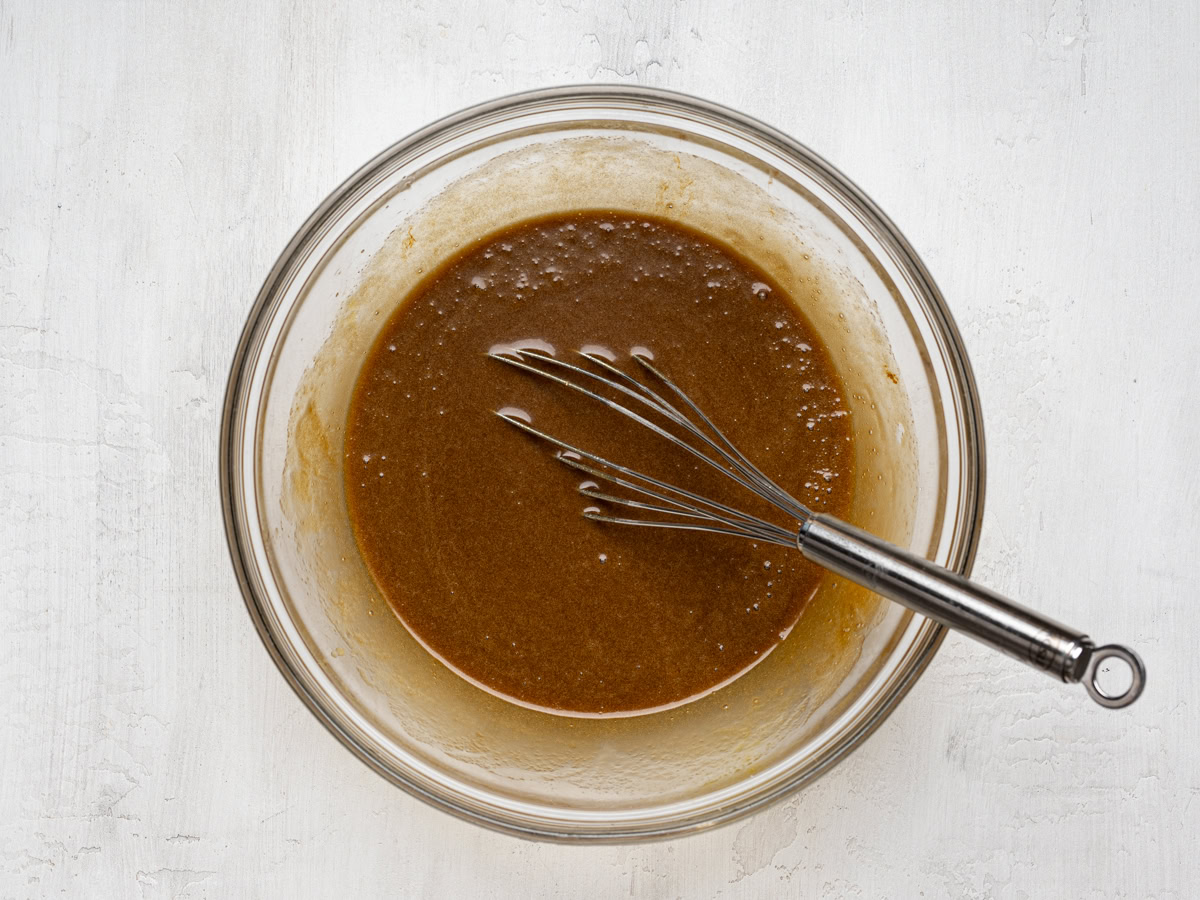 wet ingredients in a glass mixing bowl