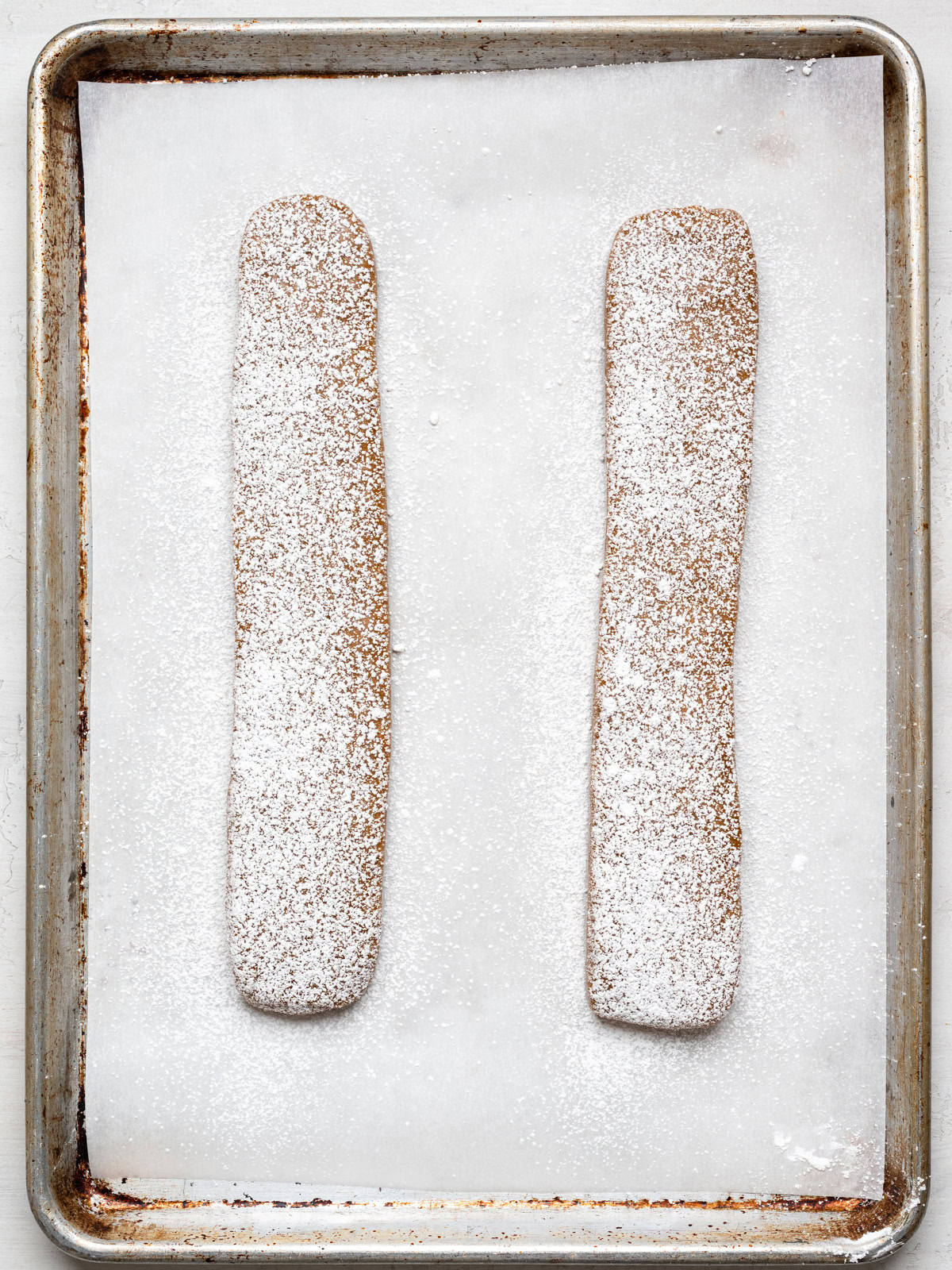 shaped logs sprinkled with icing sugar