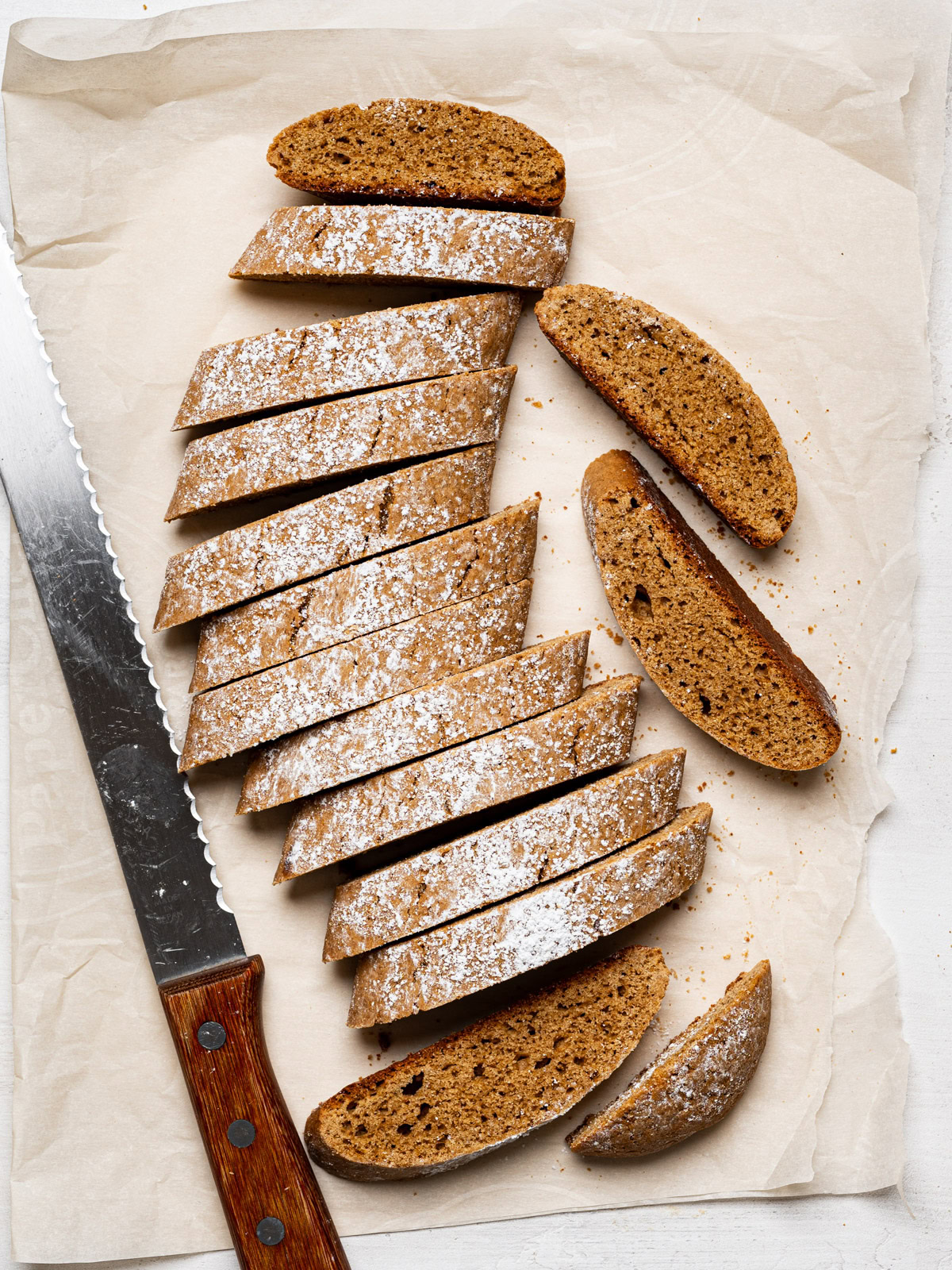 sliced biscotti with knife on the side