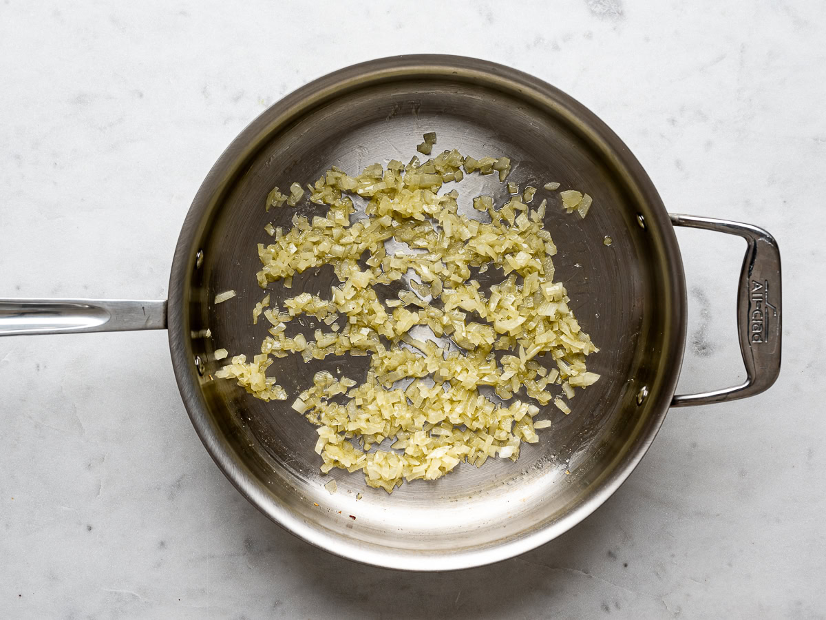 sautéed onions in a large stainless steel skillet