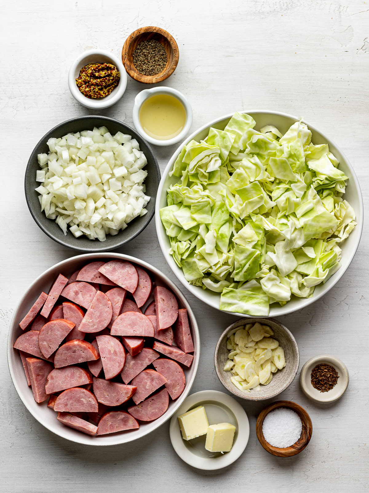 Recipe ingredients prepared in bowls.