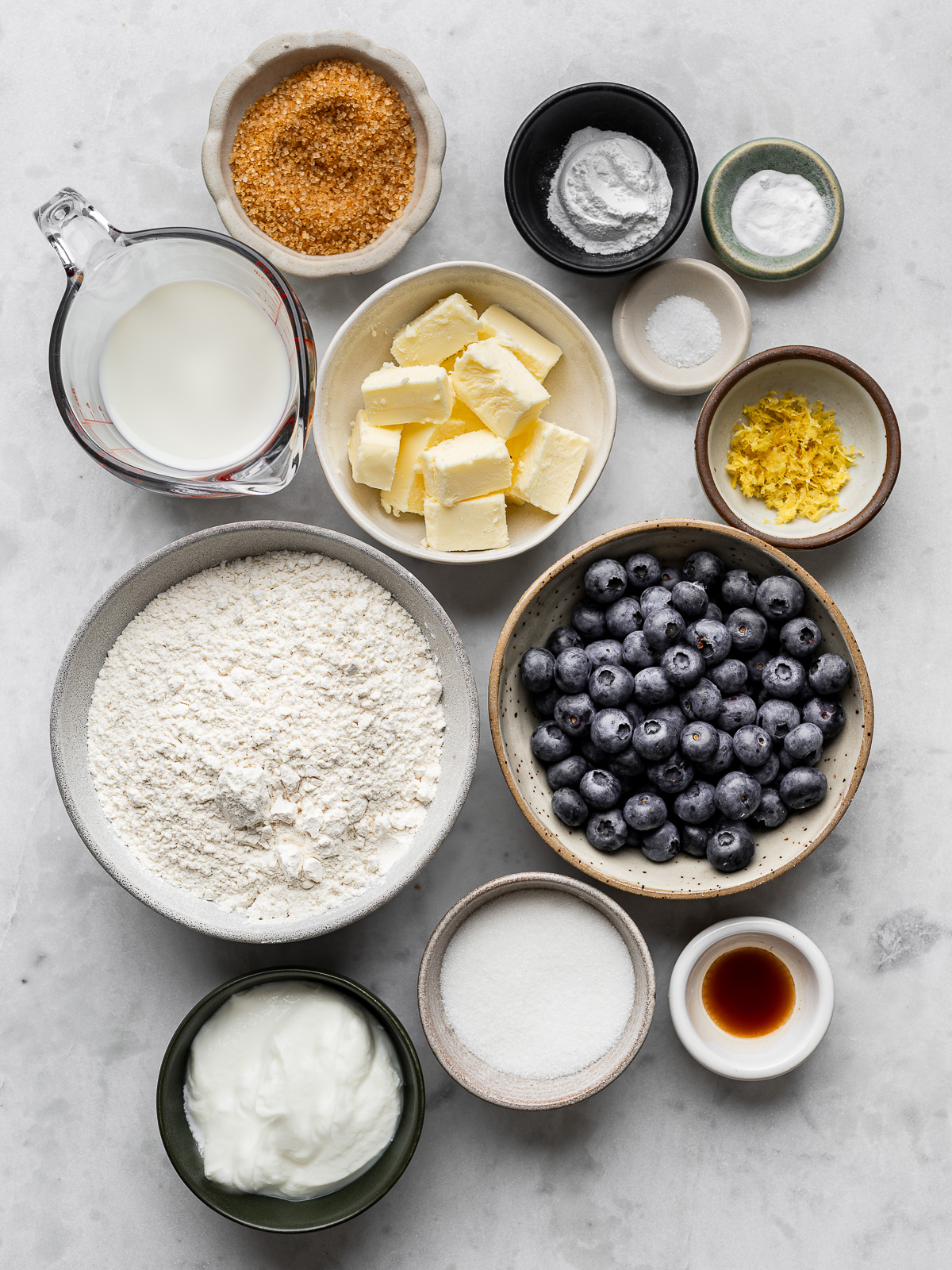 Recipe ingredients prepared in small bowls.