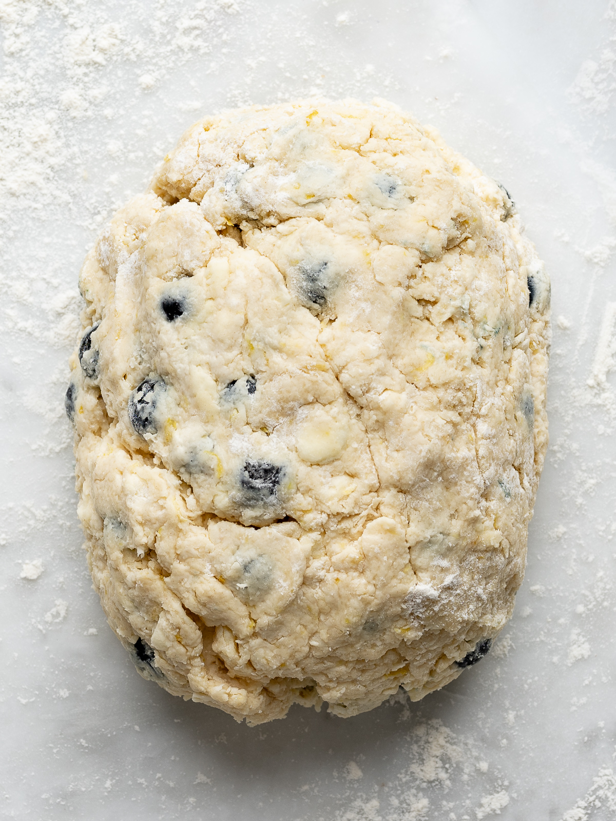 Dough shaped into a rectangular ball.