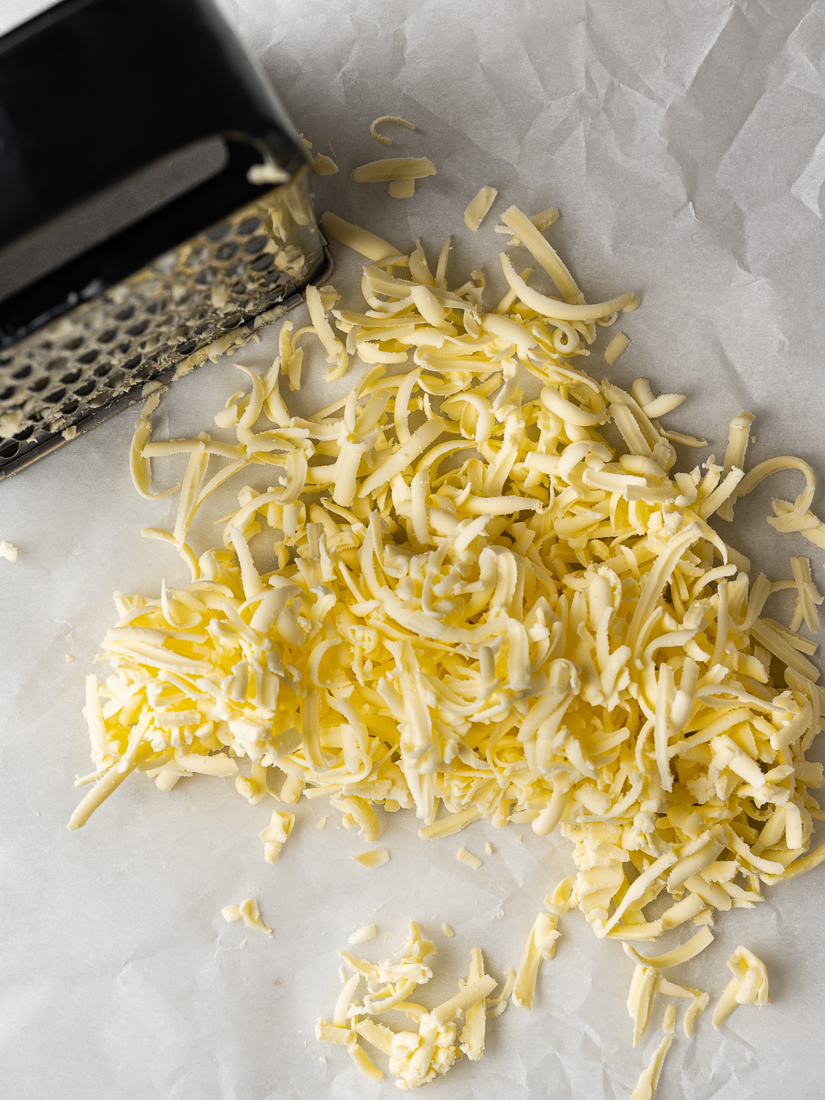 Butter grated with a box grater.