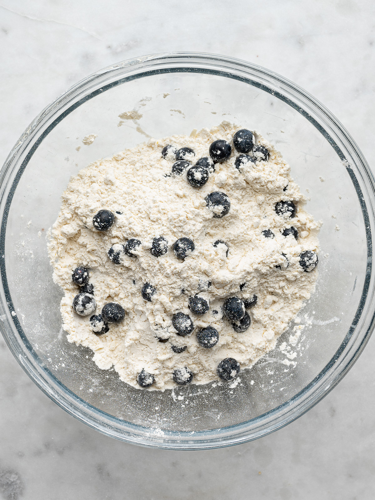 Blueberries tossed with flour mixture.