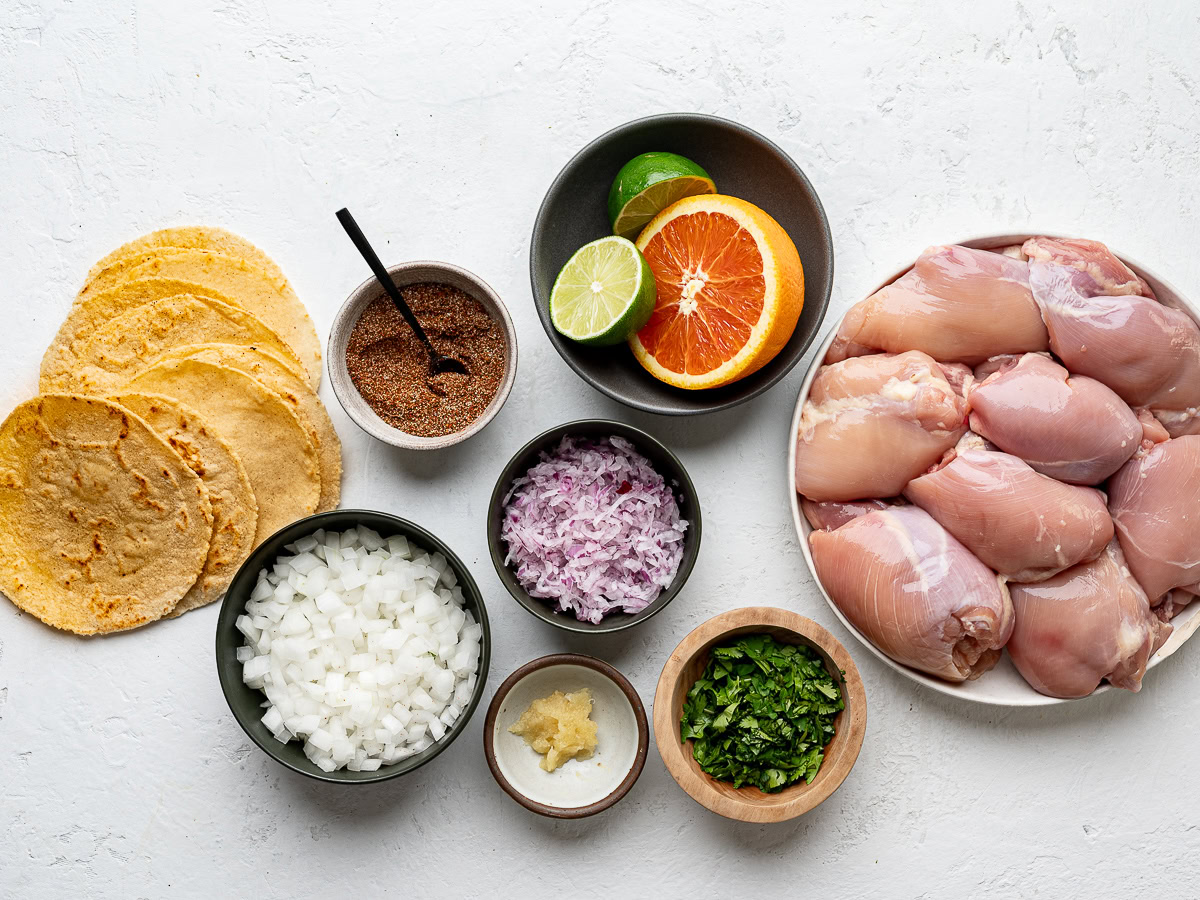 Recipe ingredients prepared in bowls. 
