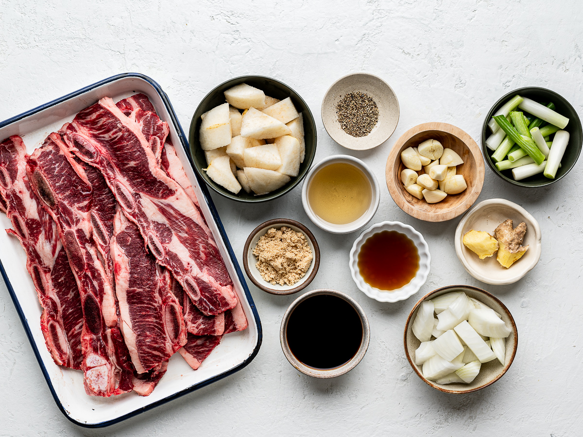 Recipe ingredients prepared in bowls and plates. 
