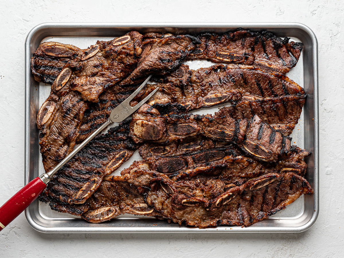 grilled Korean short ribs on a baking sheet.