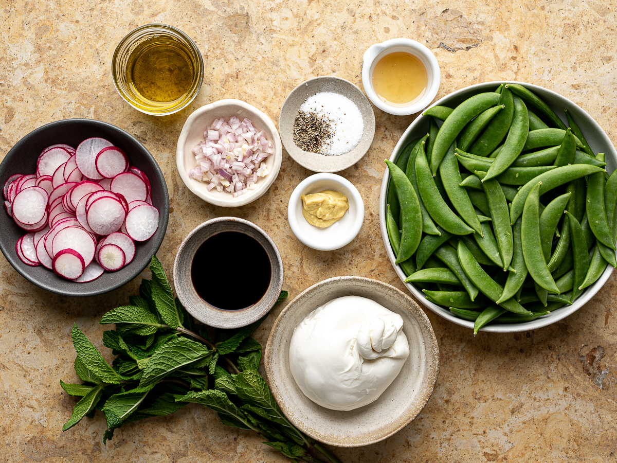 Recipe ingredients prepared in bowls.