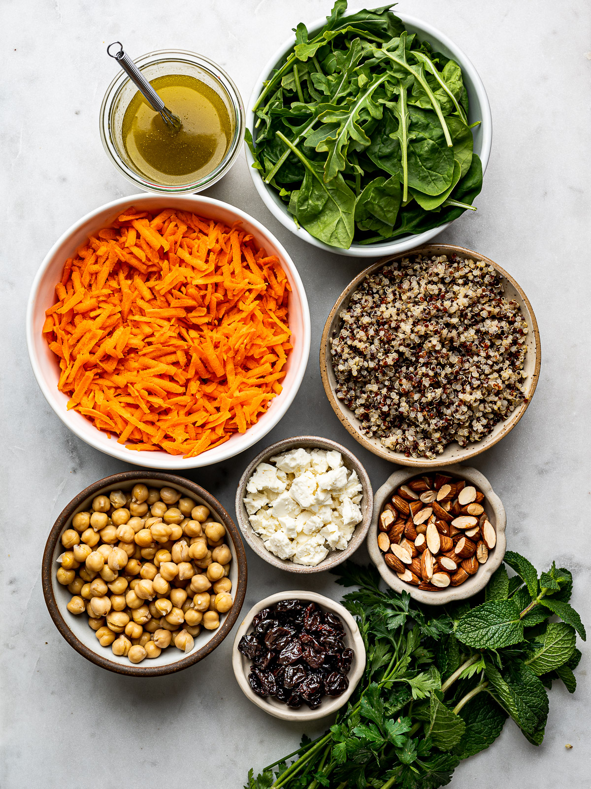 Recipe ingredients prepared in bowls.