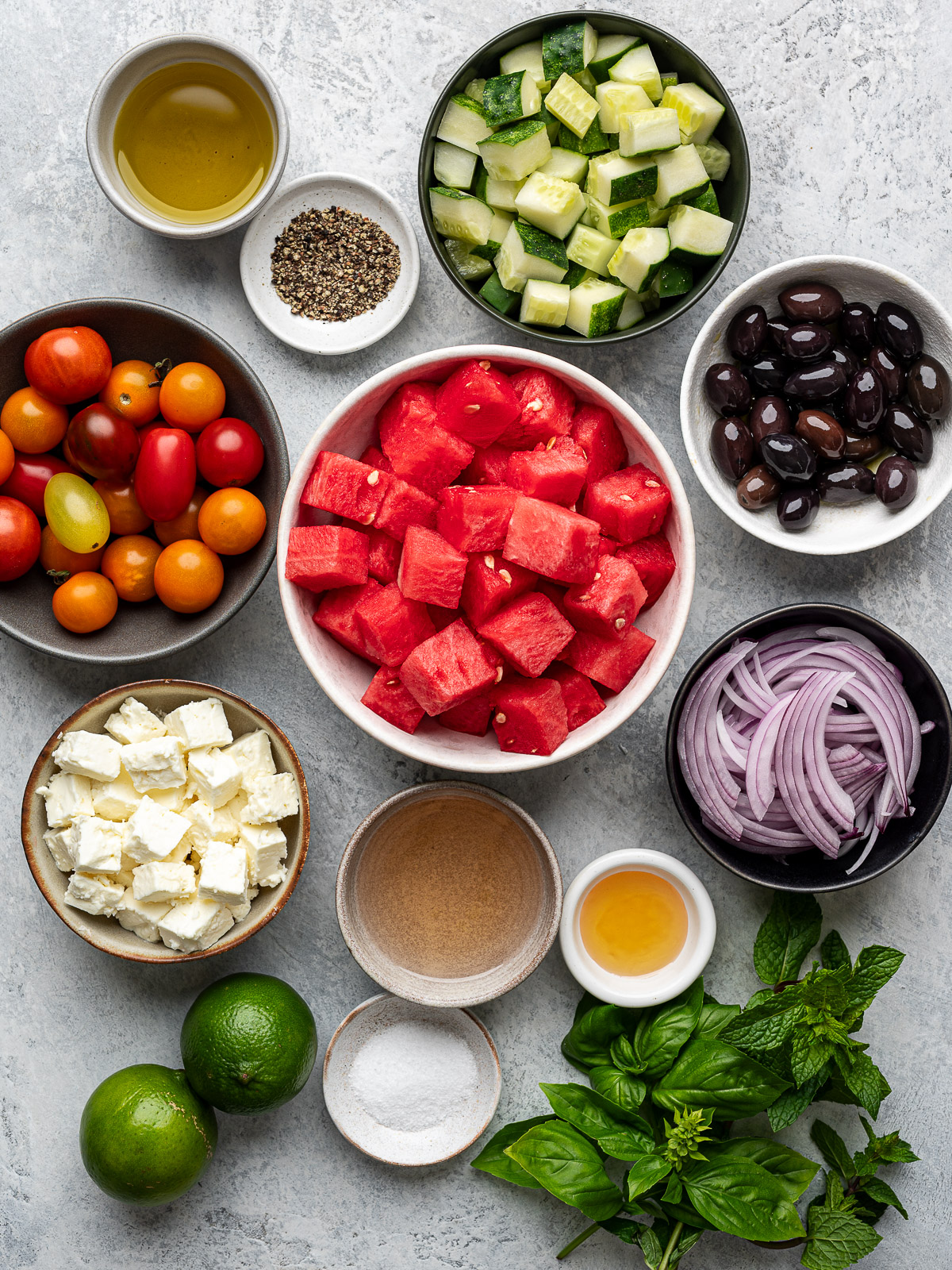Recipe ingredients prepared in bowls.