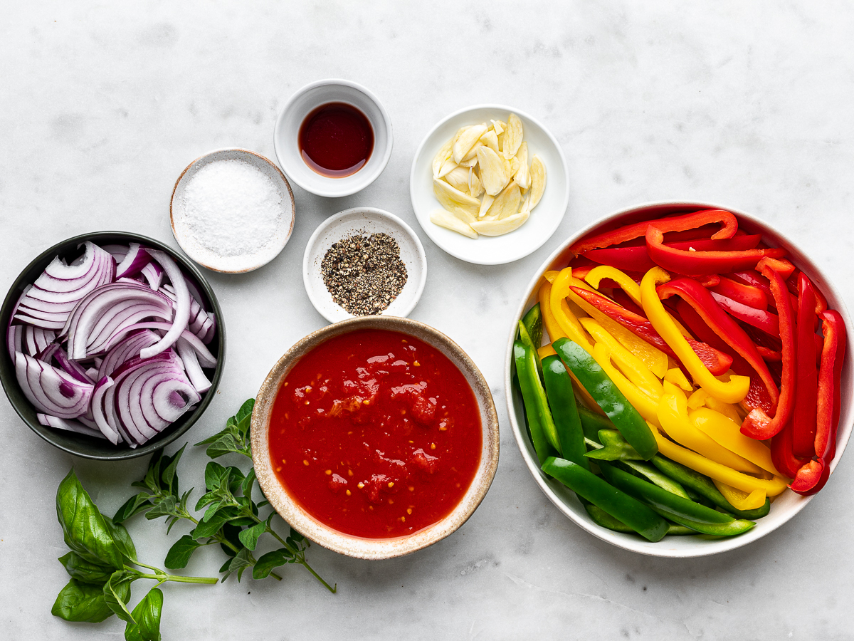 Recipe ingredients prepared in bowls.
