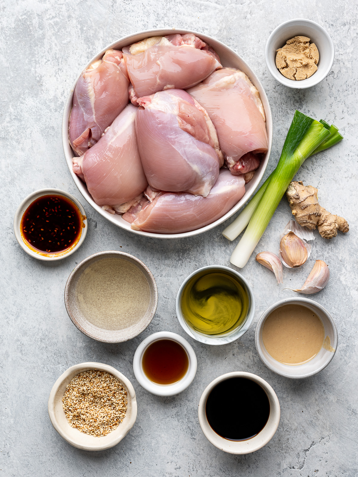 Recipe ingredients prepared in bowls.