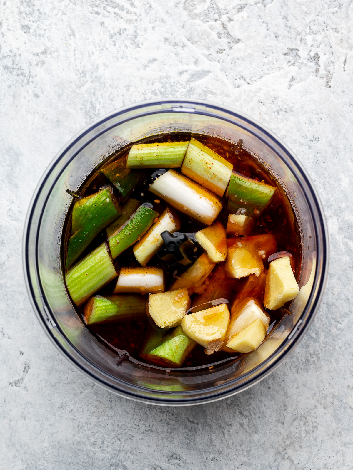 Ingredients for sesame ginger dressing in blender.
