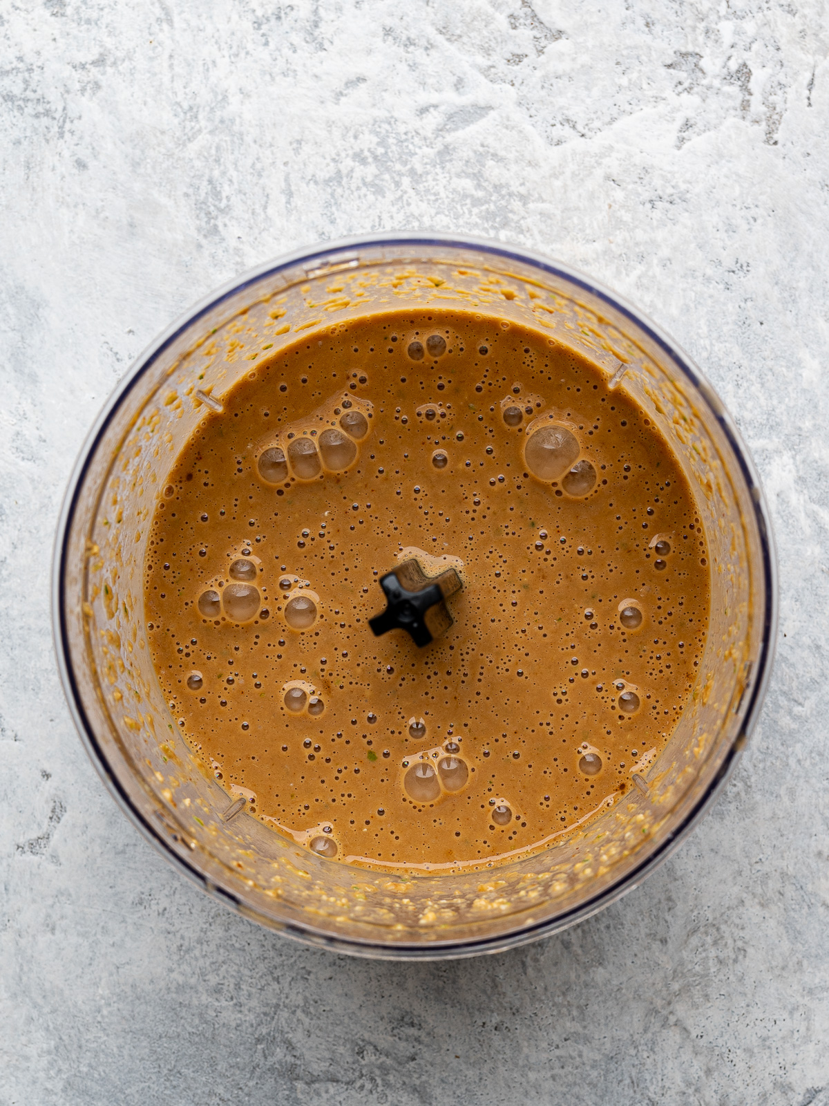 Blended sesame ginger dressing in blender.