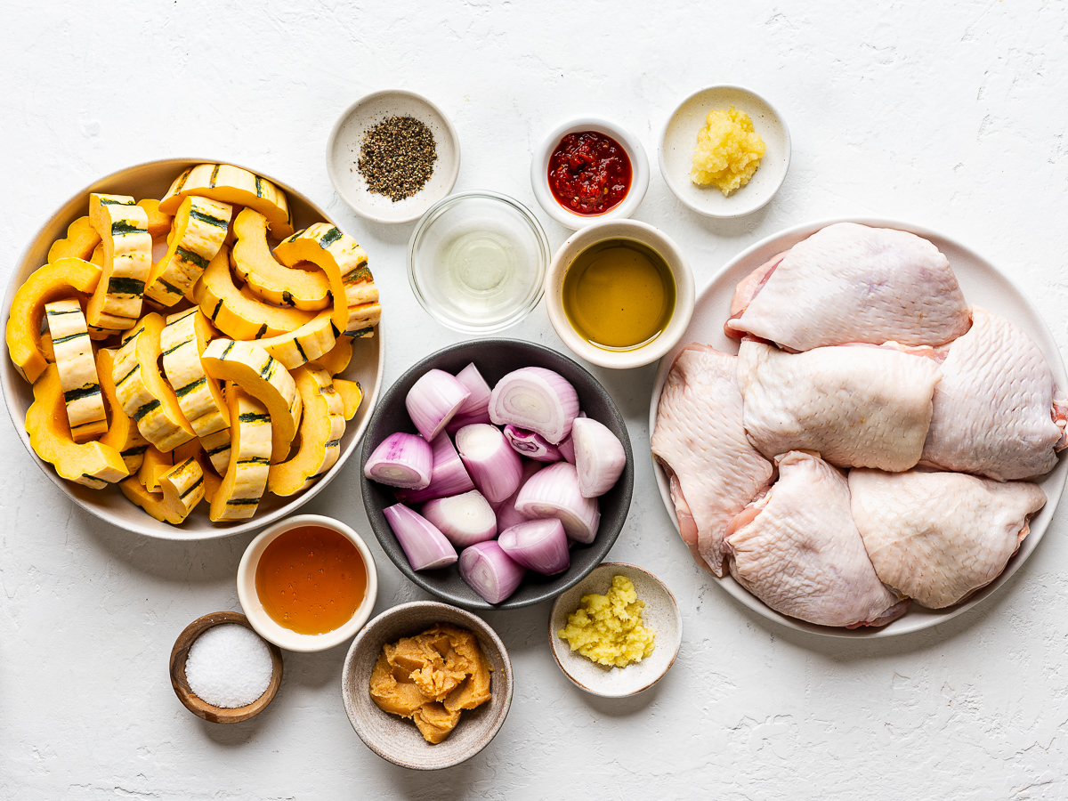 Recipe ingredients prepared in bowls.
