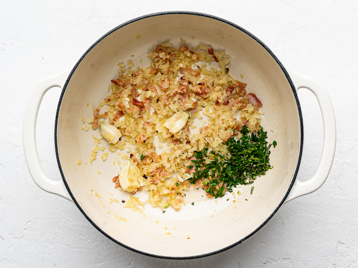 Pancetta and onion mixture in pot. 
