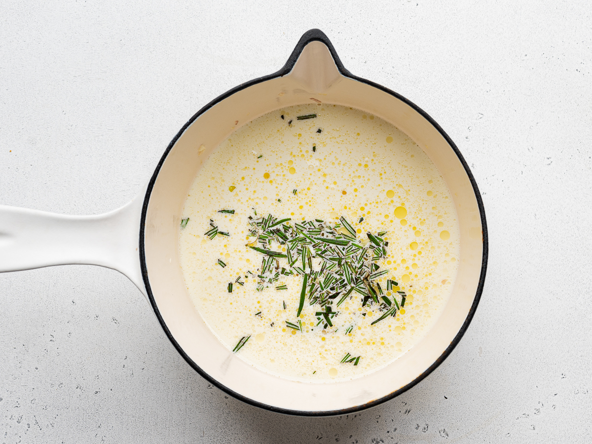 Cream mixture in white saucepan.