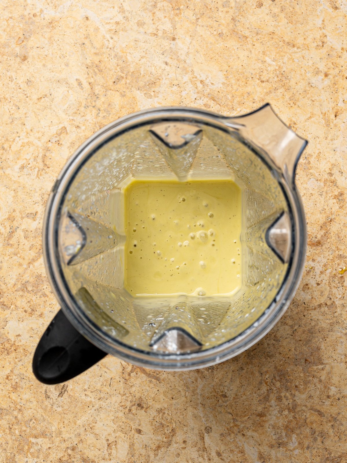 All of the vinaigrette ingredients blended in blender jar. 