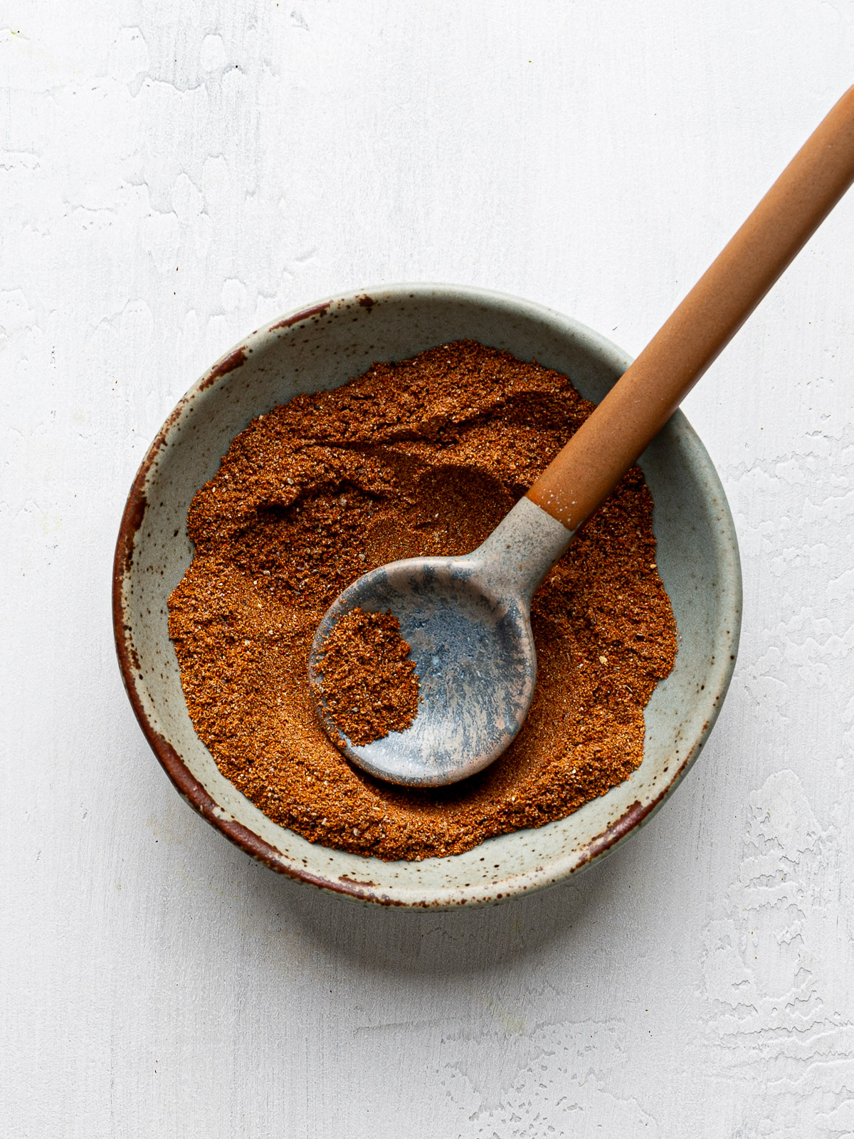 Moroccan dried spices combined in a small bowl.