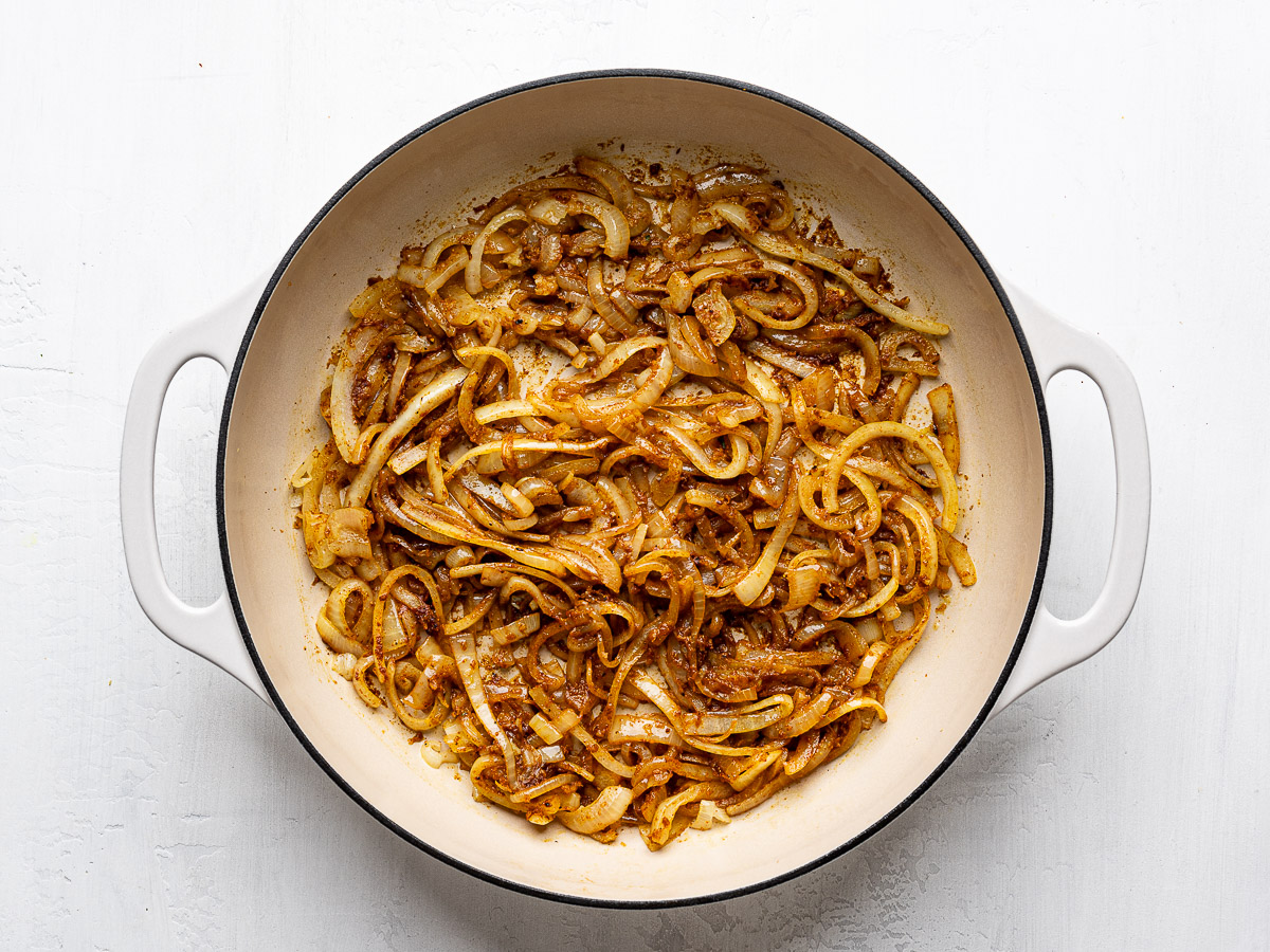 Sautéed onions and garlic in skillet tossed with dried spices.