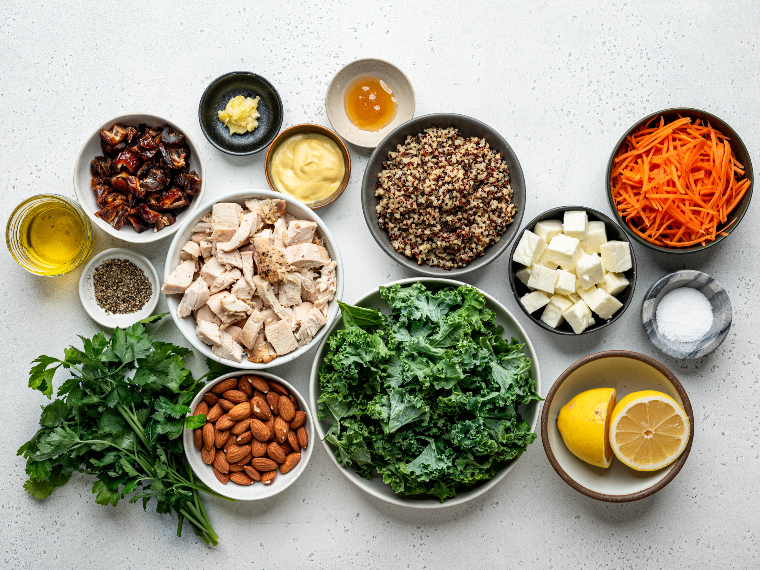 Recipe ingredients prepared in bowls.