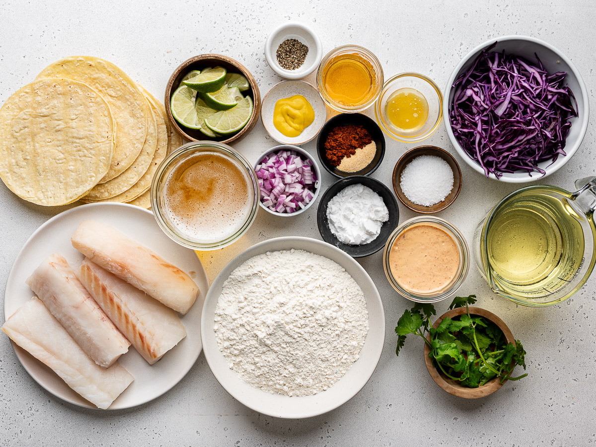 Recipe ingredients prepared in small bowls and plates. 