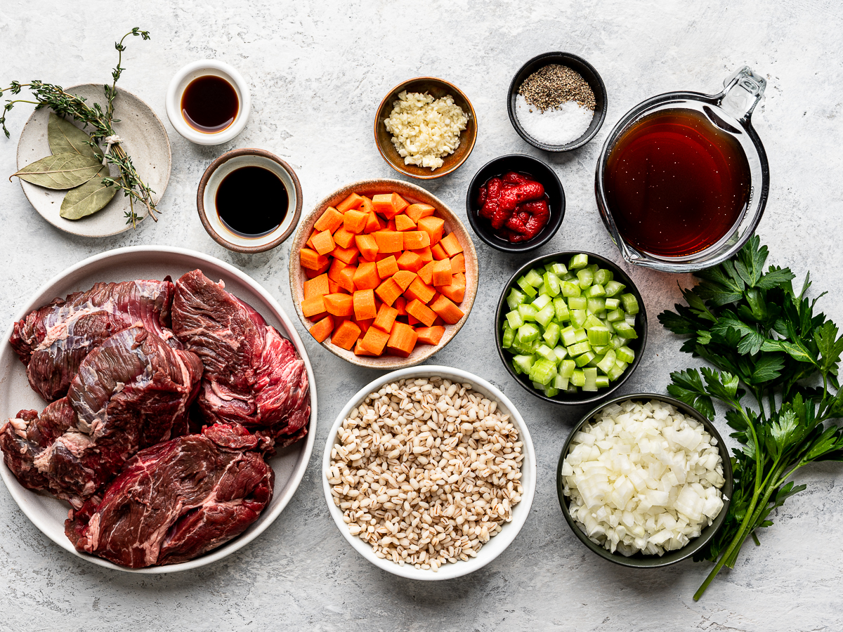Recipe ingredients prepared in small bowls and plates.