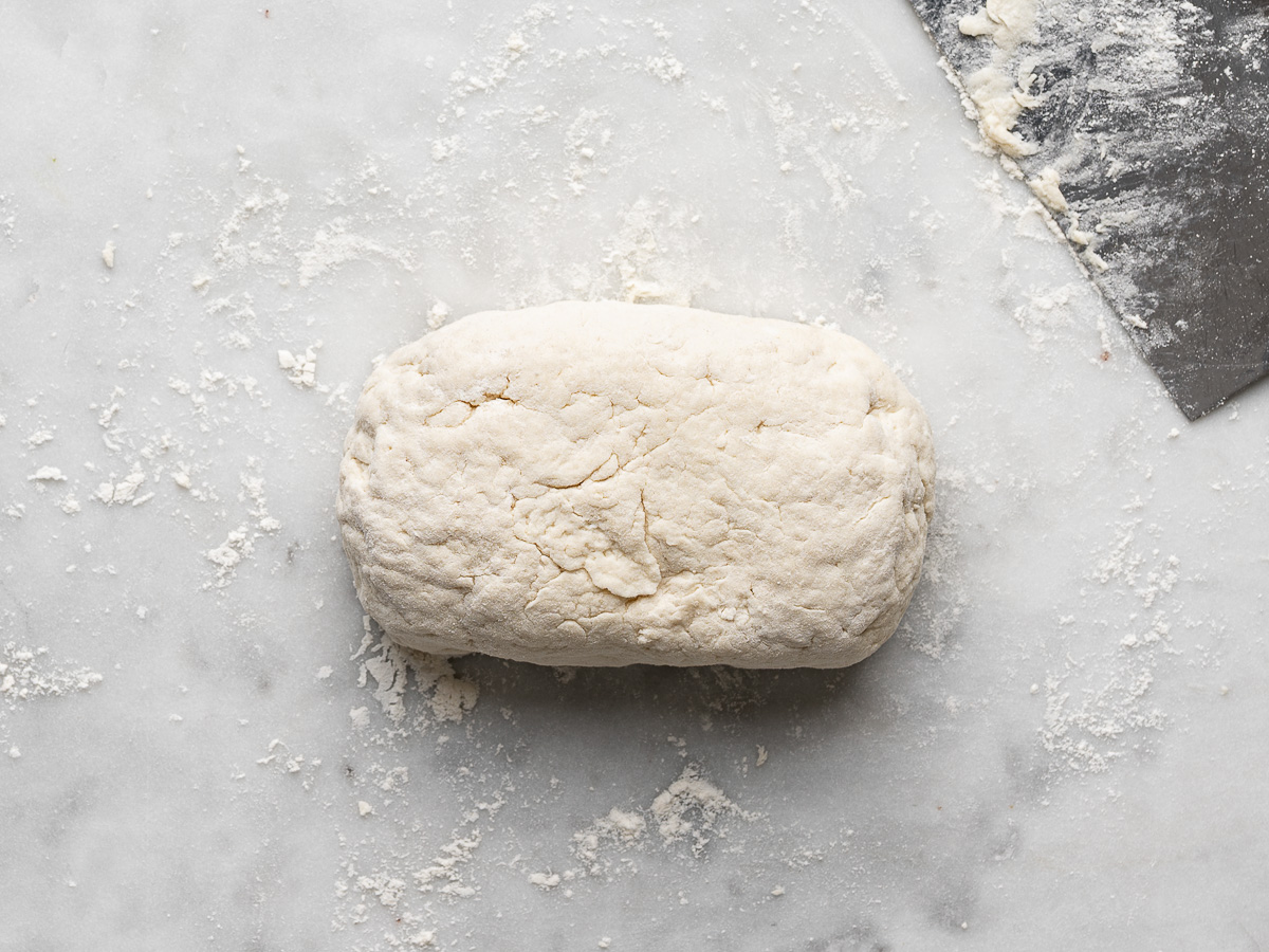 Dough ball on marble surface. 