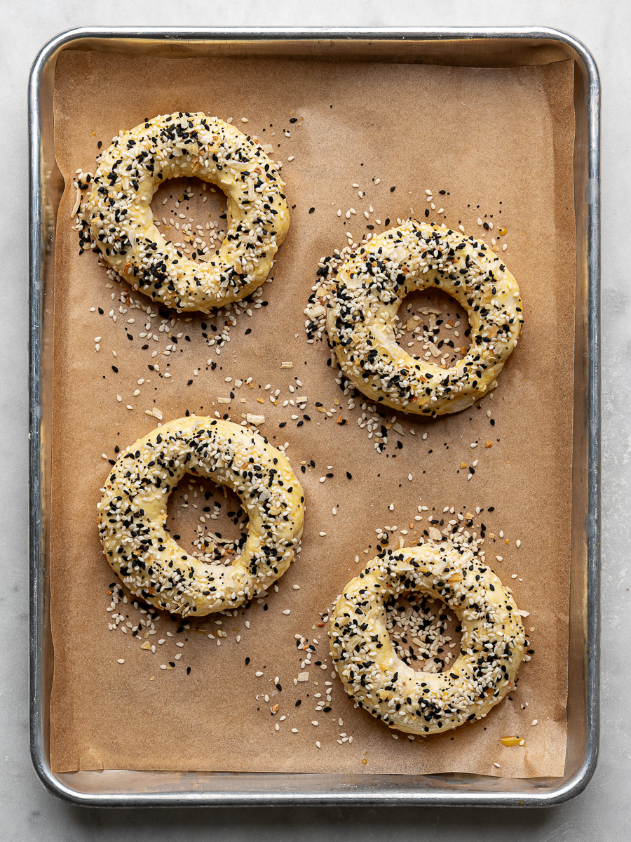4 un-baked cottage cheese bagels sprinkled with everything but the bagel topping. 