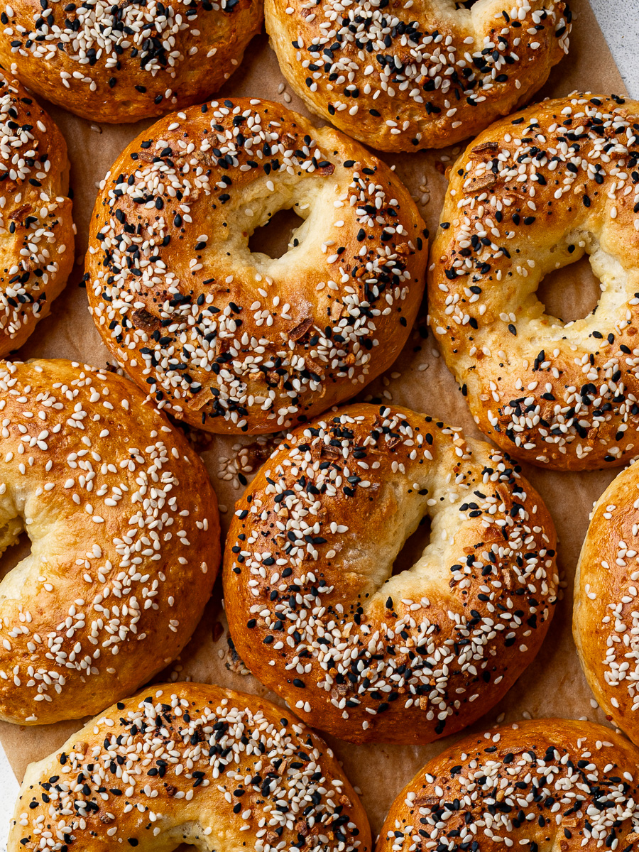 Multiple baked cottage cheese bagels with everything but the bagel topping.