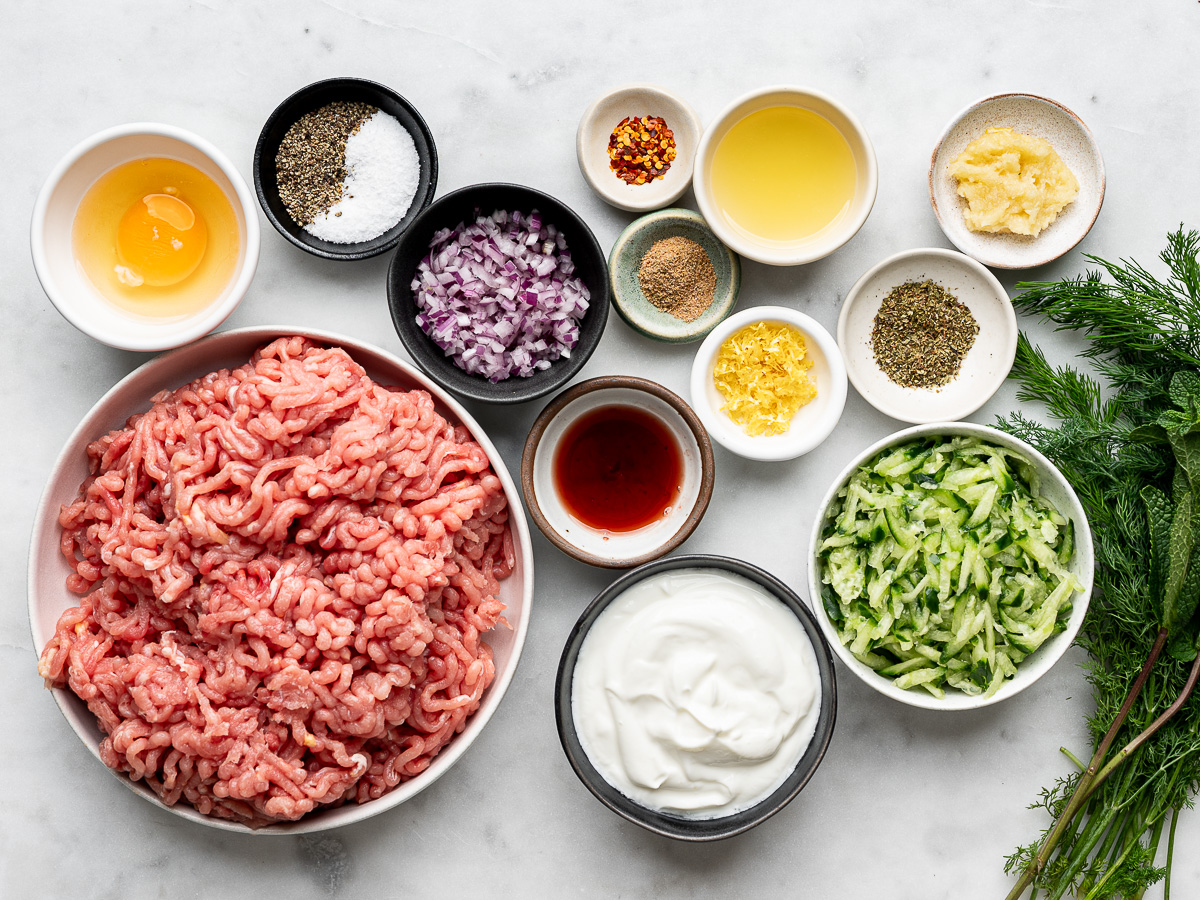 Recipe ingredients prepared in bowls.