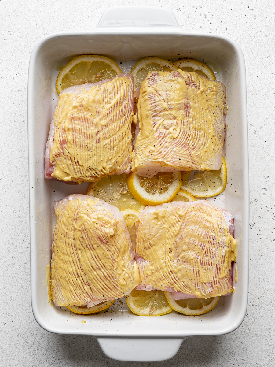 Cod fillets brushed with dijon mustard. 