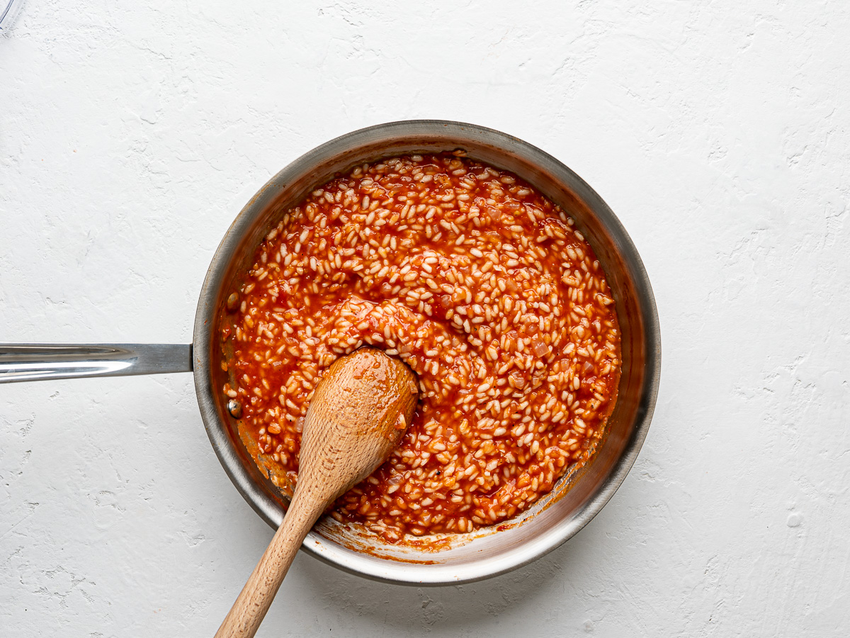 Pre-cooked rice mixture in skillet.