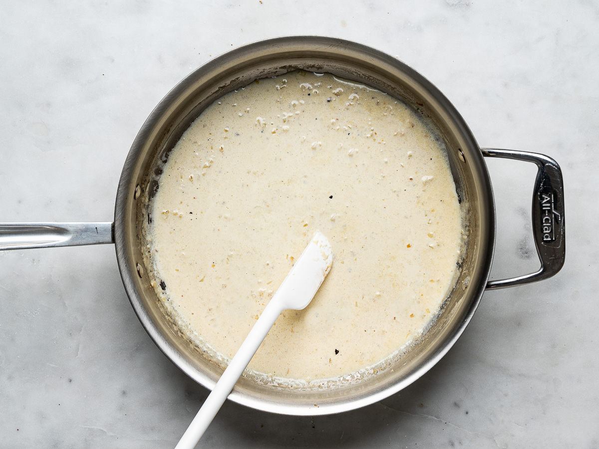 Cream sauce in skillet.