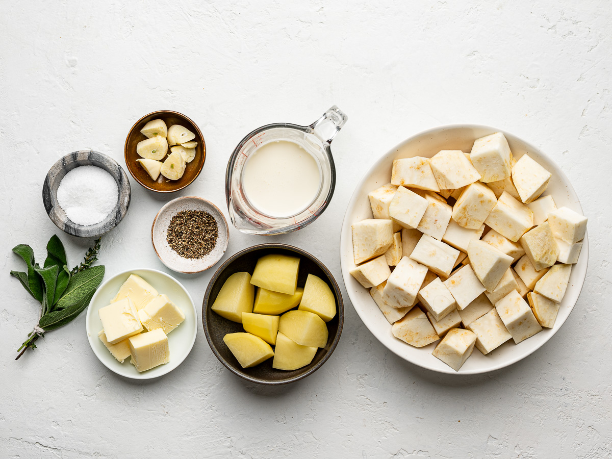 Recipe ingredients for celery root mash prepared in bowls.