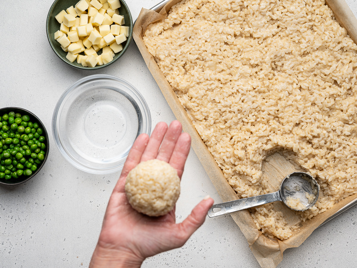 Shaping the rice ball by hand.