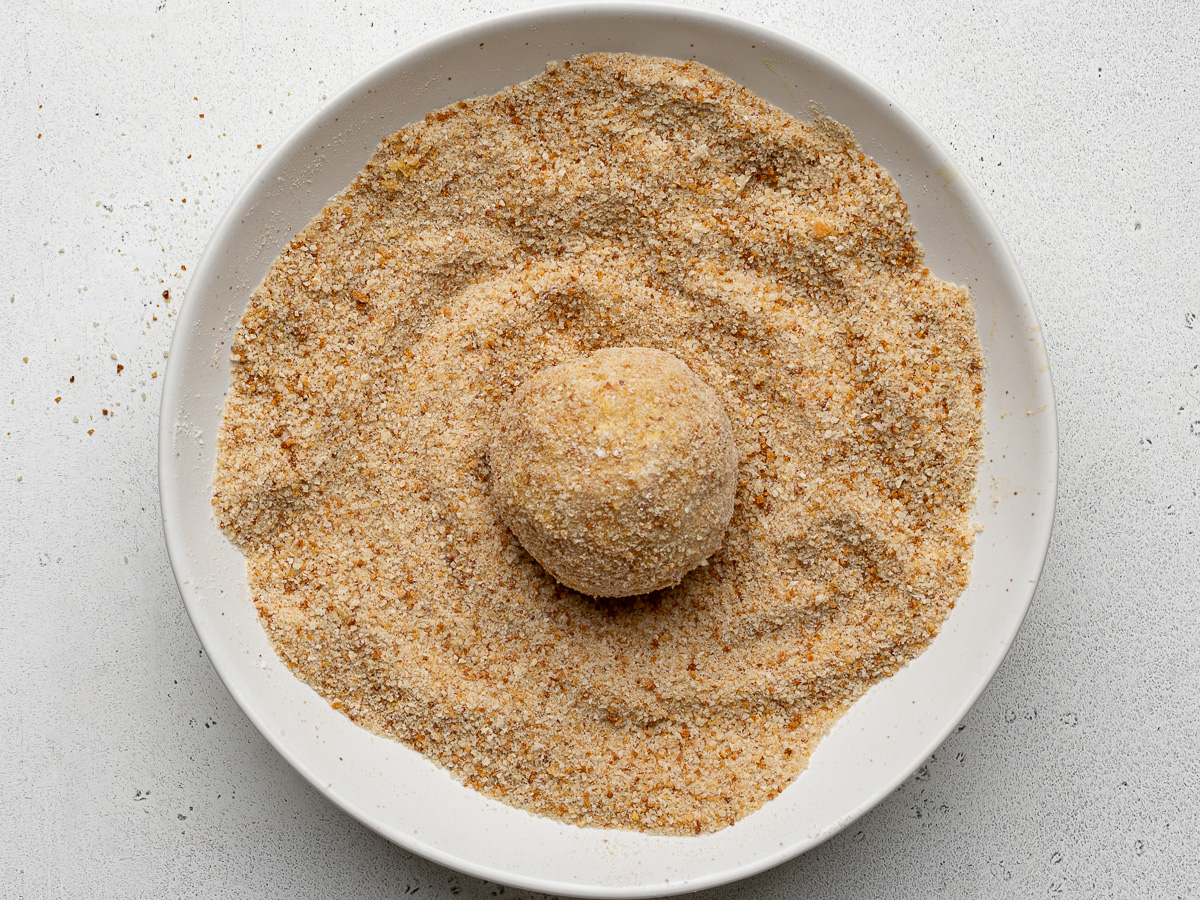 Rice ball coated in breadcrumbs.