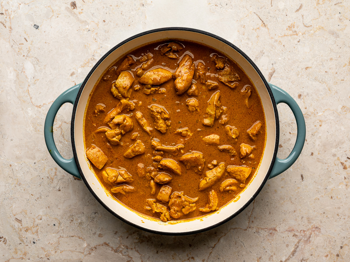 Finished coconut chicken curry in a pan.