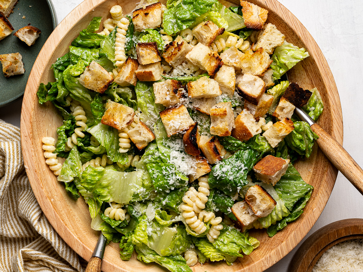 Croutons added to tossed Caesar Pasta Salad.