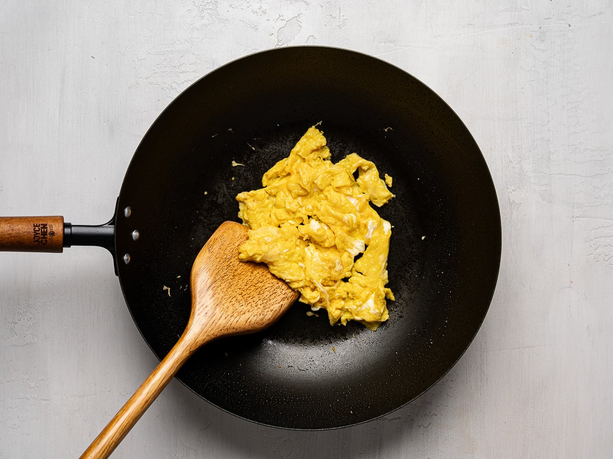Eggs lightly cooked in wok.