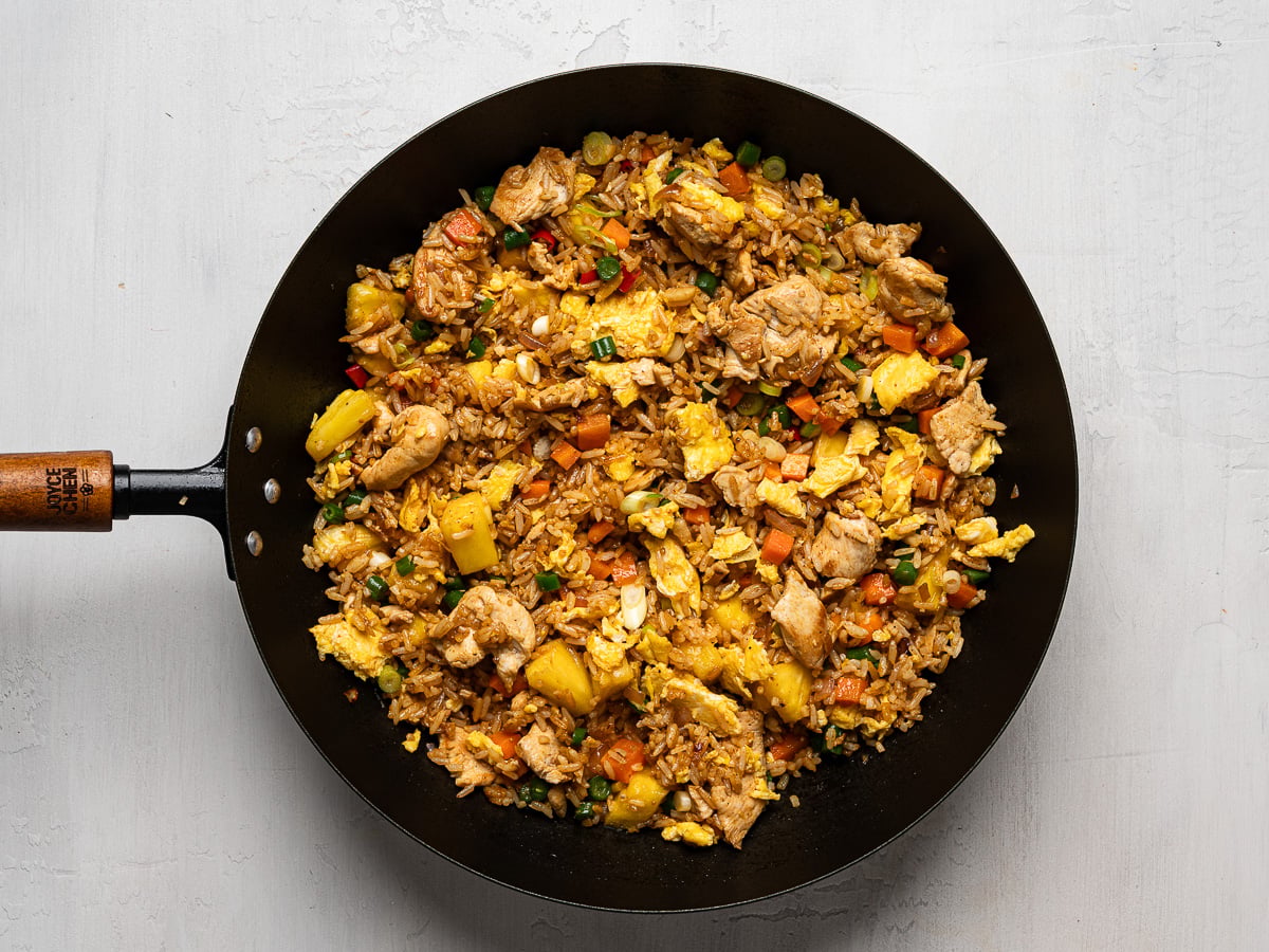 Finished dish of pineapple fried rice in wok.